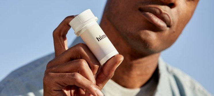 Hims - Man with Hims bottle
