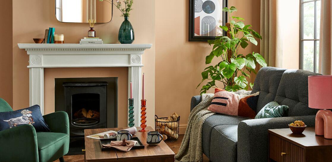 Home Essentials ways to save banner featuring a room set containing sofas, side tables, decor and more products for trhe home