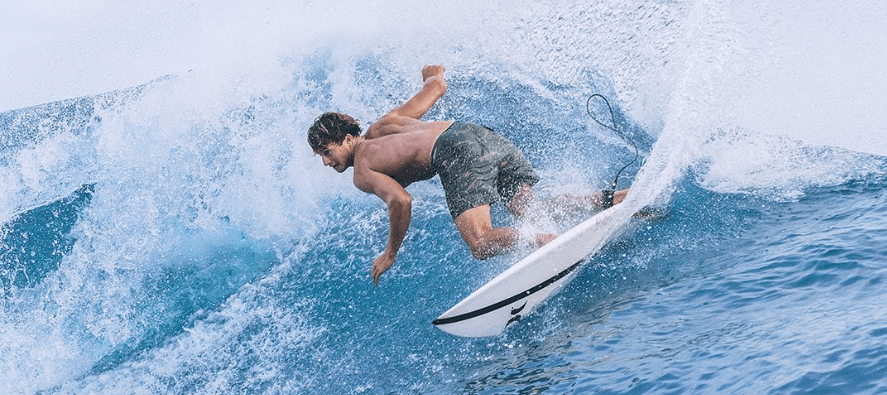 Hurley more ways to save banner featuring a man in shorts surfing a wave