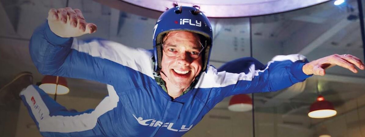 iFly banner - Man skydiving