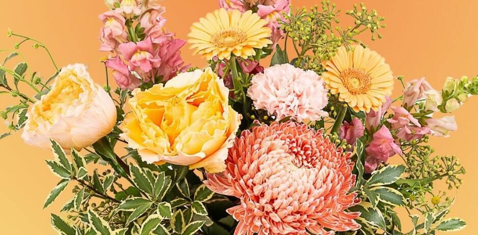 Interflora deals page image showing a vibrant selection of flowers on a yellow background