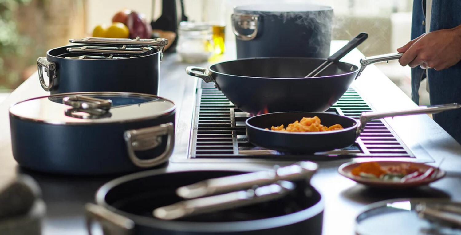 Joseph Joseph deals page image featuring a set of pans being used on a hob