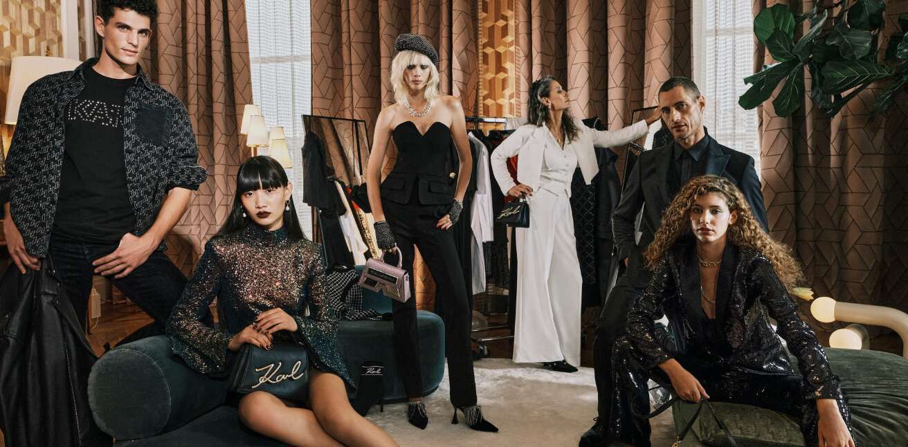 Karl Lagerfeld ways to save banner. Image shows a room full of people wearing designer black and white clothing