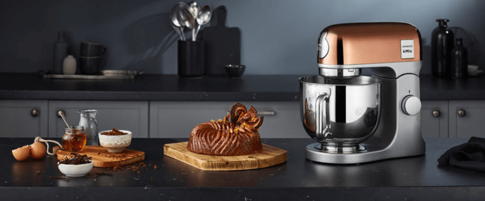 Kenwood how to save more money guide banner. Image shows a Kenwood blender and a cake on a kitchen worktop