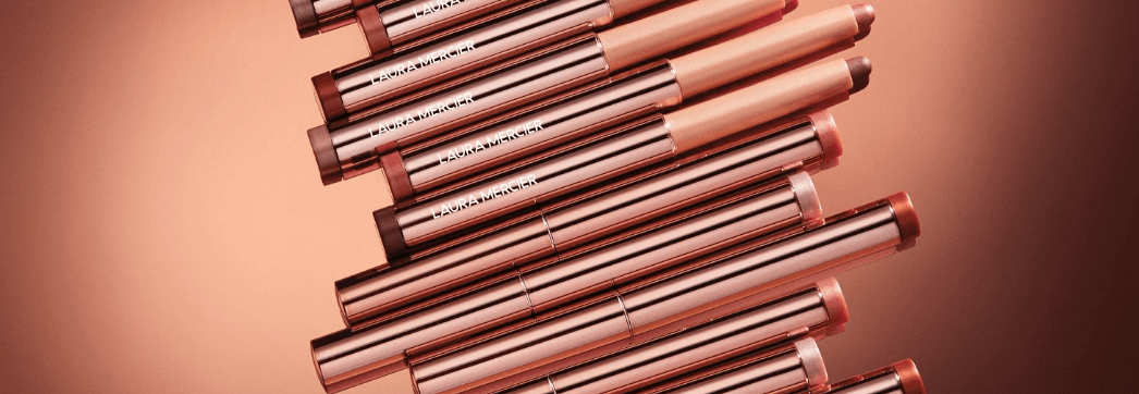 Laura Mercier more ways to save banner featuring multiple branded cosmetic sticks