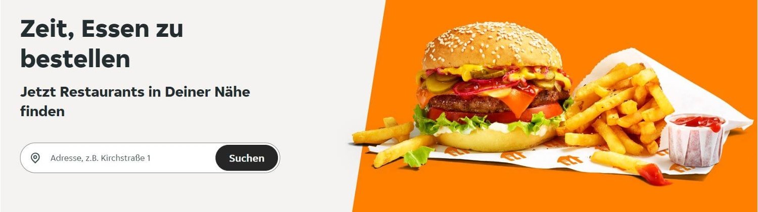 Banner der Seite für Lieferando Gutscheincodes: Foto von Burger und Pommes mit Suchmaske und Aufschrift "Zeit, Essen zu bestellen – Jetzt Restaurants in Deiner Nähe finden"