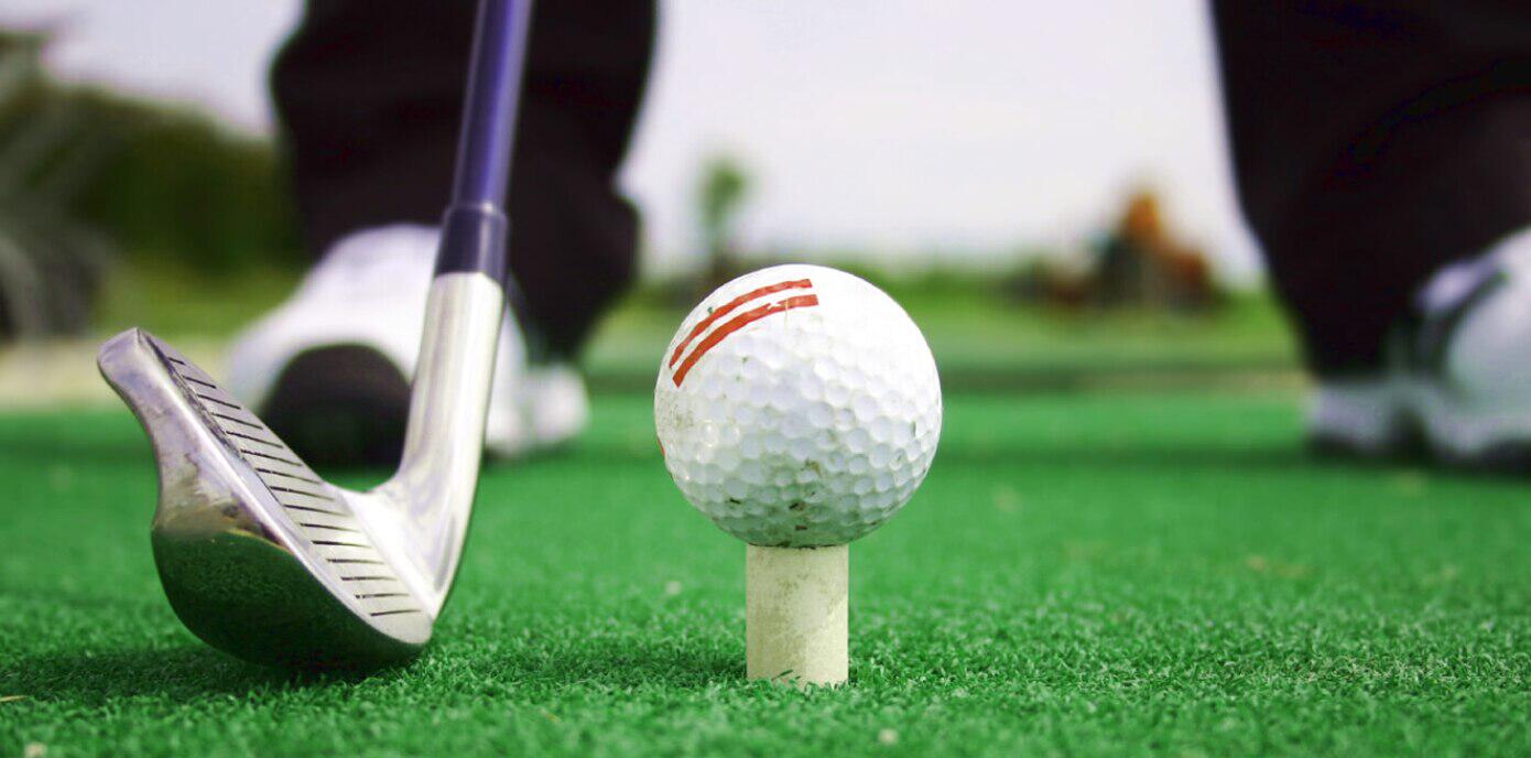 Major Golf Direct ways to save banner - A closeup of a golf club preparing to hit a golf ball with blurry course in the background