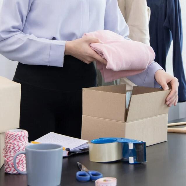 man-packaging-up-clothes-to-sell_1.jpeg