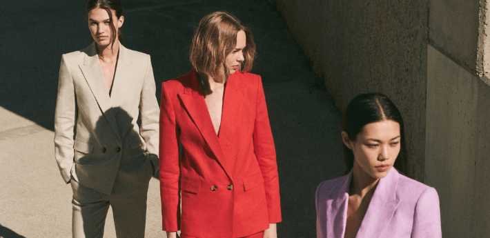 Mango savings page banner featuring three women wearing different colour suits