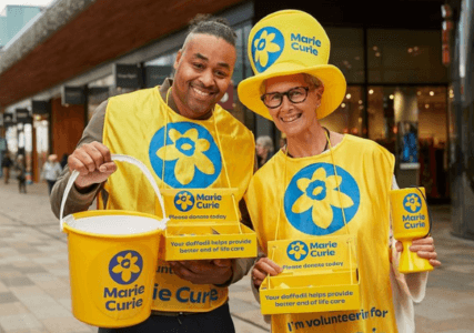 Marie Curie fundraisers wearing yellow