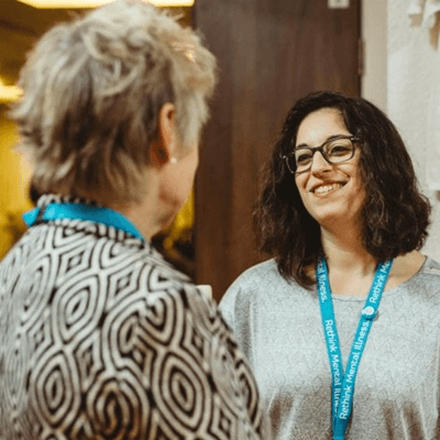 two Mental Health UK fundraisers having a conversation