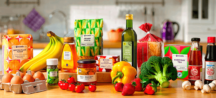 Ocado offers page banner showing a selection of groceries they sell on a kitchen worktop