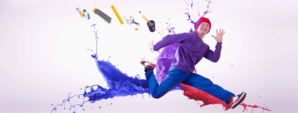 Printerinks - Man jumping in front of printing accessories