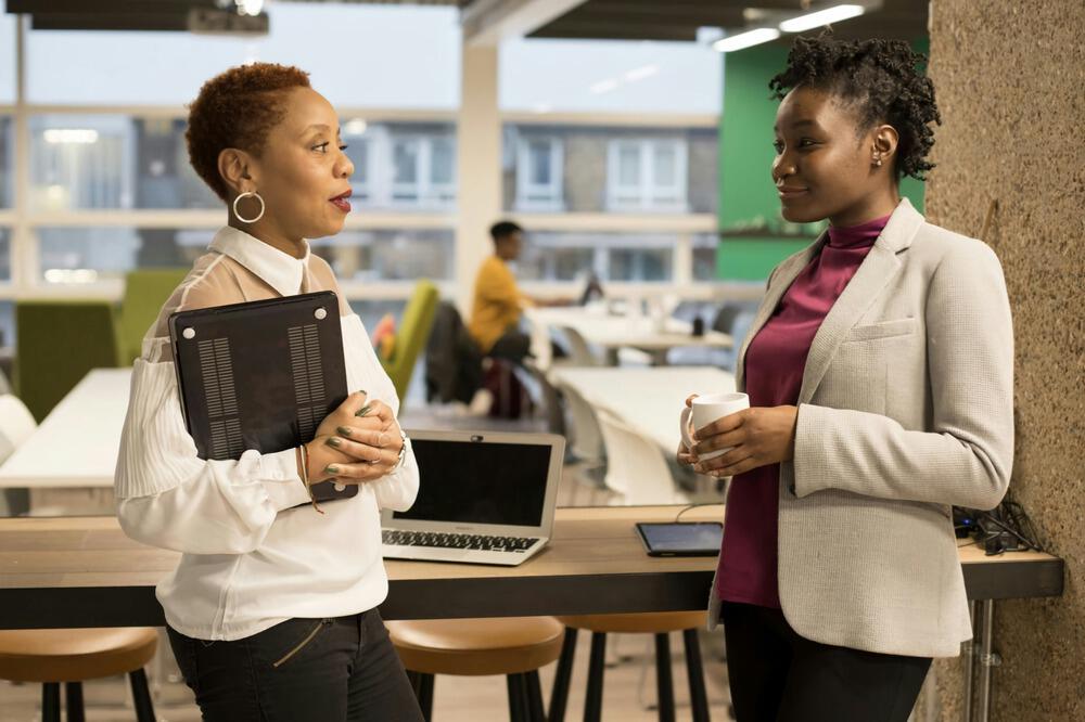 Two professional women in an office