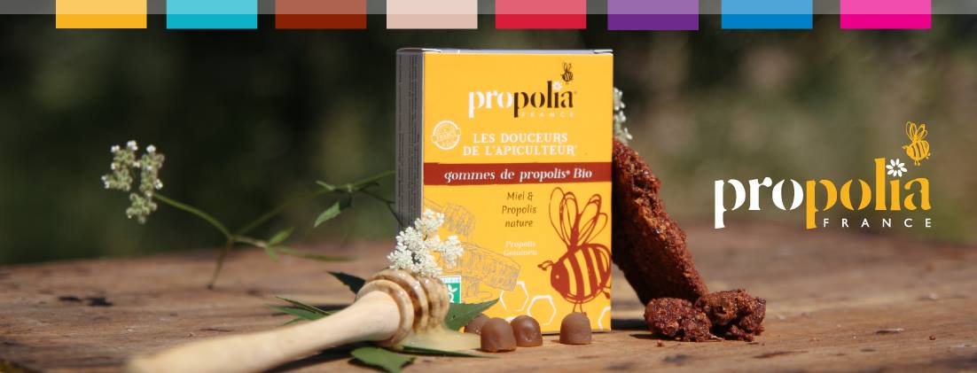 Boite de gommes Propolia sur une table en bois
