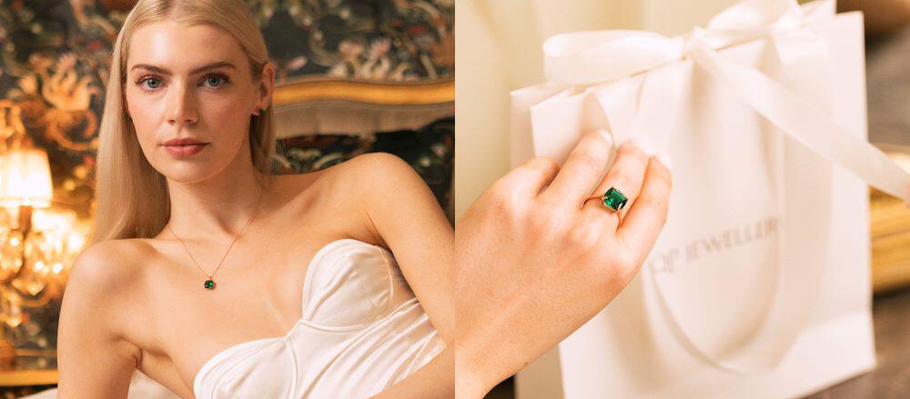 QP Jewellers set - woman wearing emerald ring and necklace