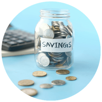 A savings jar with money in it, alongside a calculator on blue background