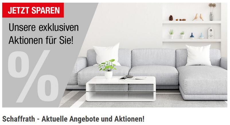 graue Wohnlandschaft mit weißen Couchtisch und dem Hinweis auf exklusive und aktuelle Schaffrath Angebote.