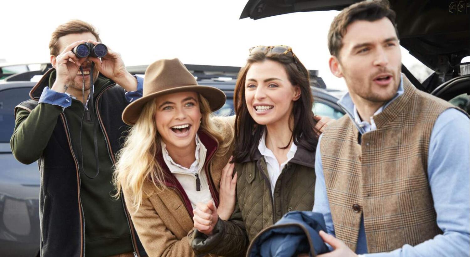 Schoffel Country savings guide showing a group of men and woman at the races, wearing event appropriate clothing