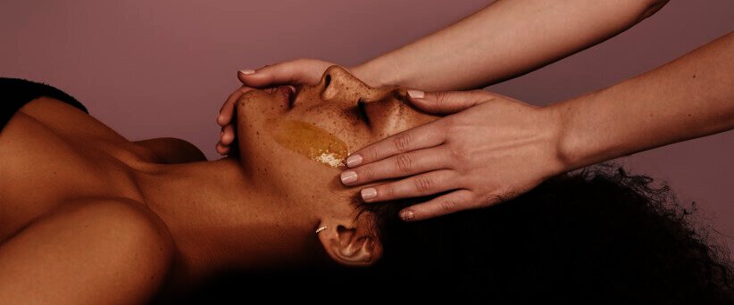 Secret Spa how to save guide banner showing woman getting a face massage