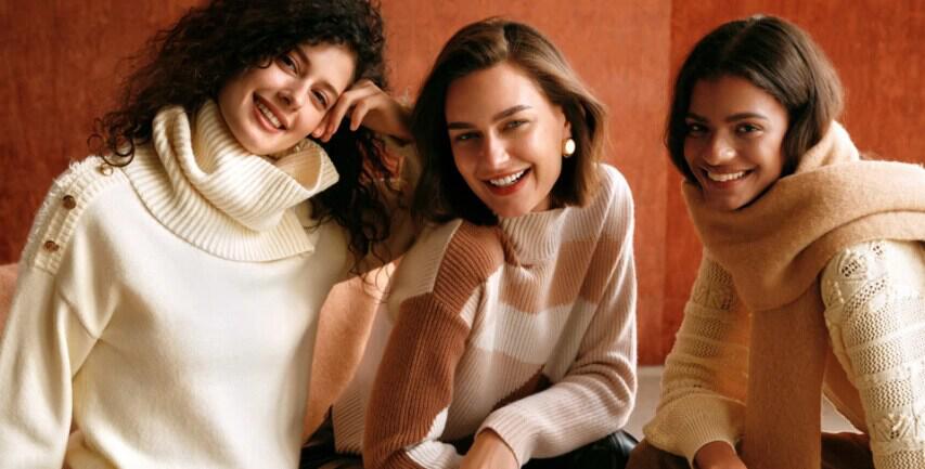 SHEIN winter image featuring three smiling women wearing knitwear