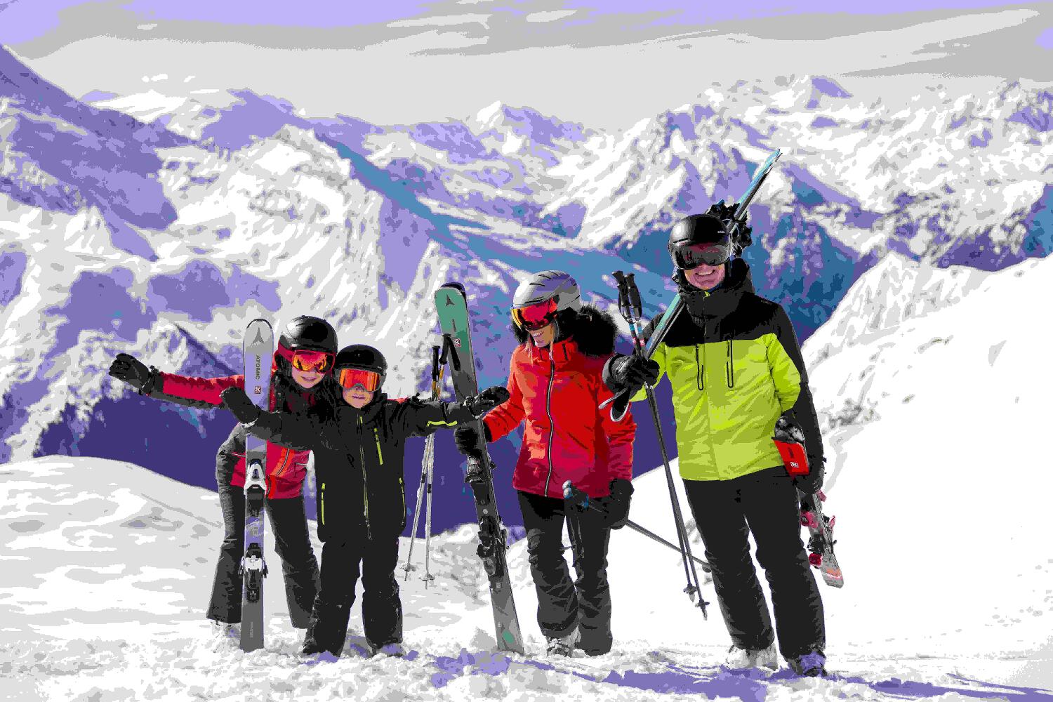 Family of four on a skiing holiday in the mountains