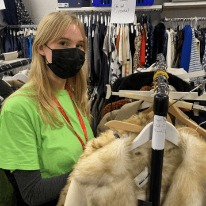 woman volunteering in a Shelter shop