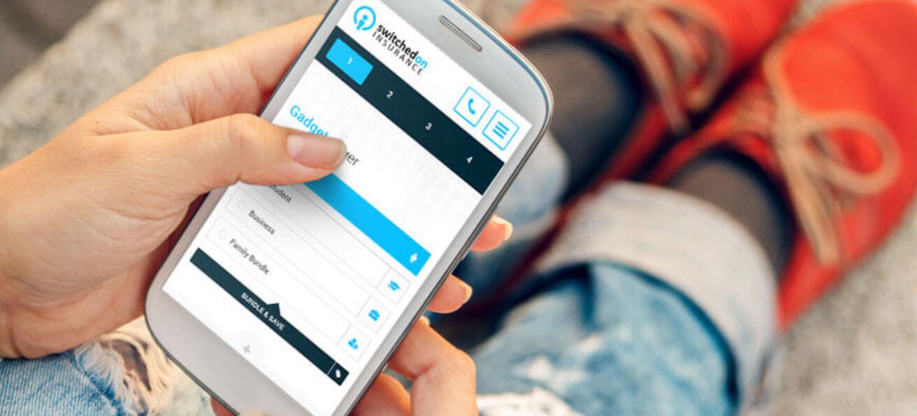 Switched On Insurance saviings tips banner featuring a close up of someone choosing gadget insurance on a smartphone