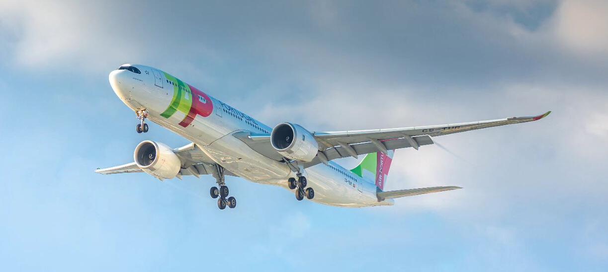 TAP Air Portugal promo page banner showing a branded plane in a light blue sky