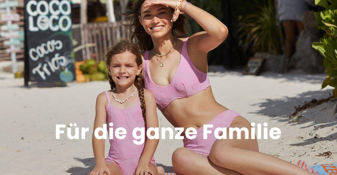 Banner für Tezenis-Bademode für die ganze Familie mit Frau in Bikini und Kind in Badeanzug