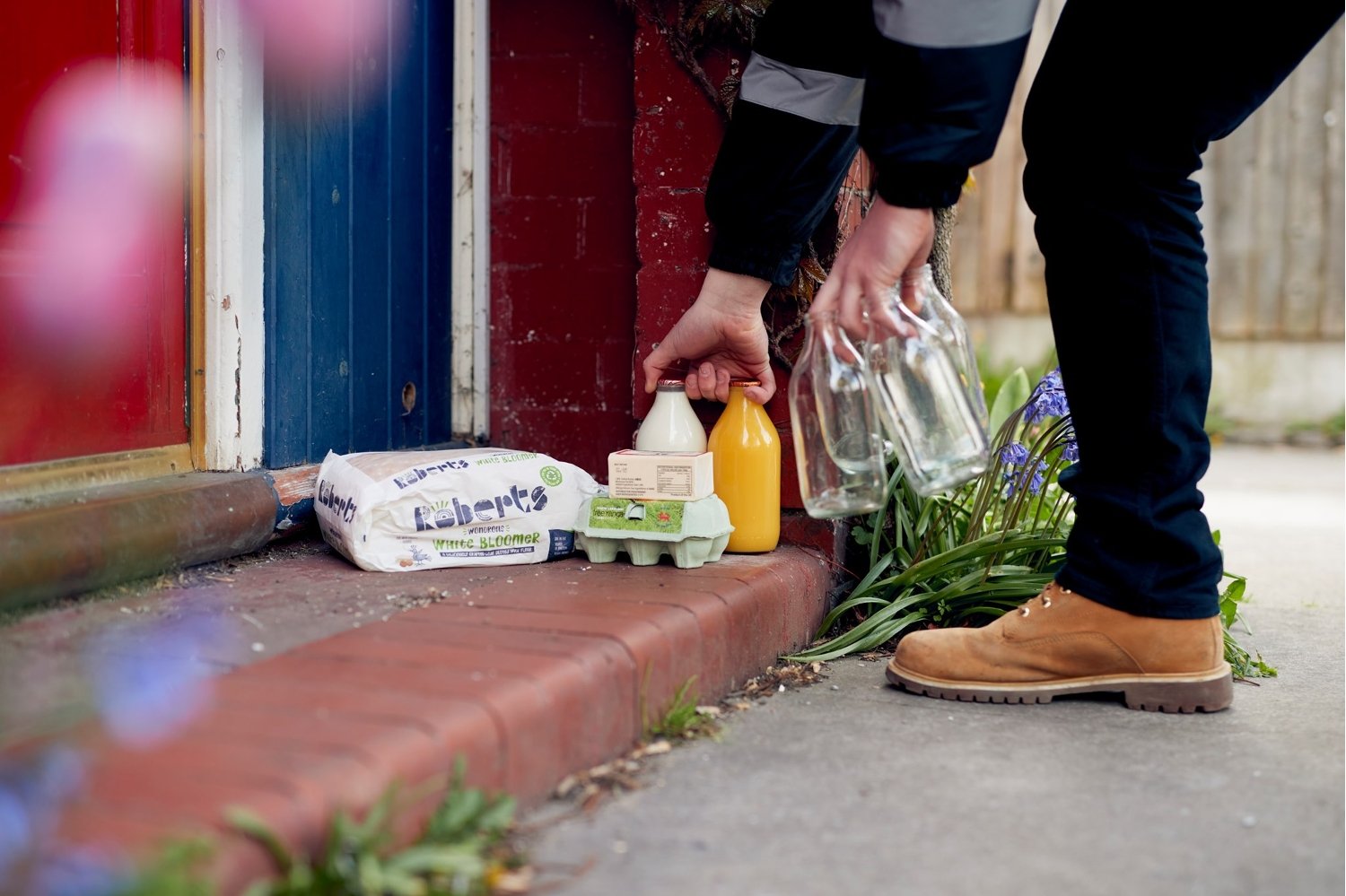 The Modern Milkman discount codes banner - milk, orange juice, eggs, butter, and bread delivery