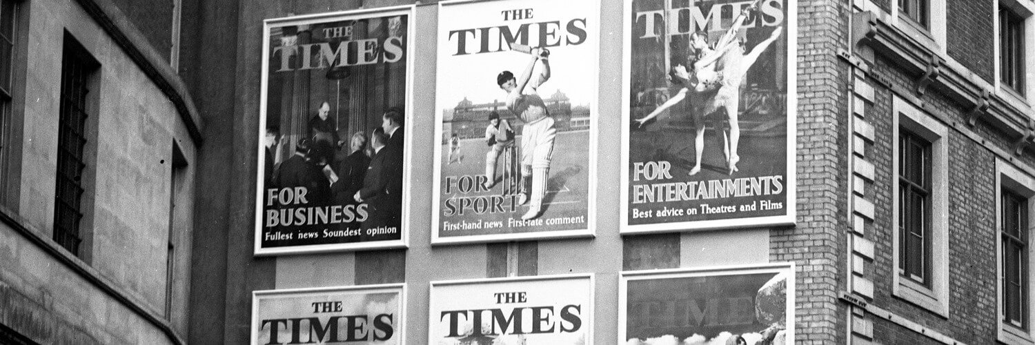 Old The Times billboard covers in a black and white image