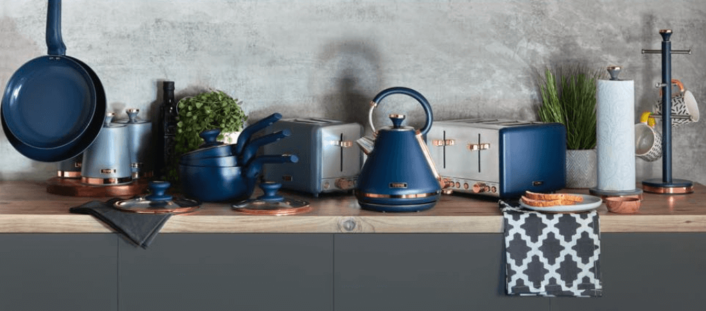 Tower Housewares how to save money banner. Image features a selection of appliances and homewares in blue and silver colours on a kitchen worktop