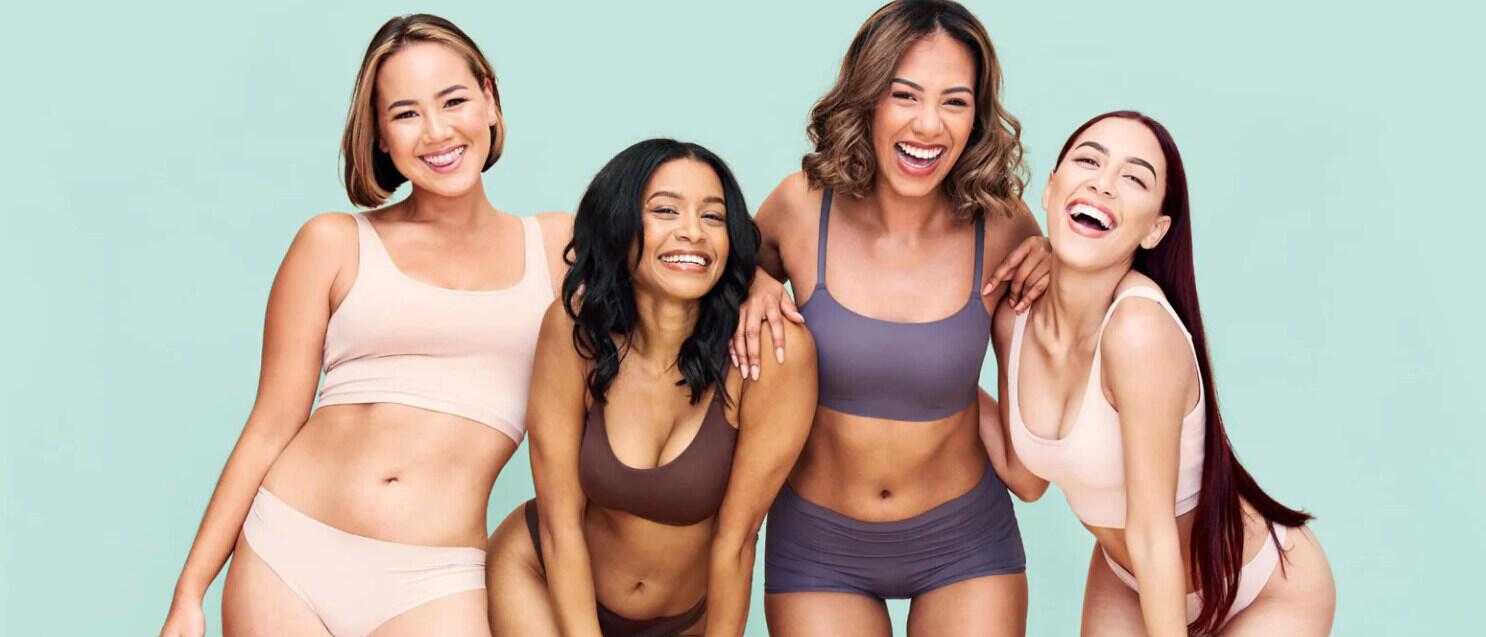 Ulike savings guide image featuring 4 women in their underwear laughing against a turquoise background