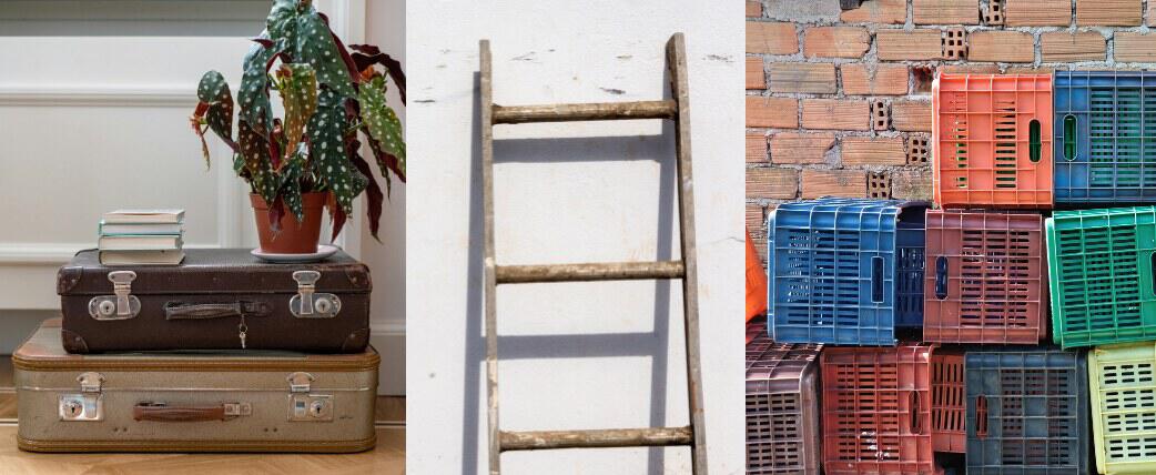 Upcycling image showing old suitcases as a side table, a ladder as a hanging rail and some brightly coloured milk crates stacked on top of each other