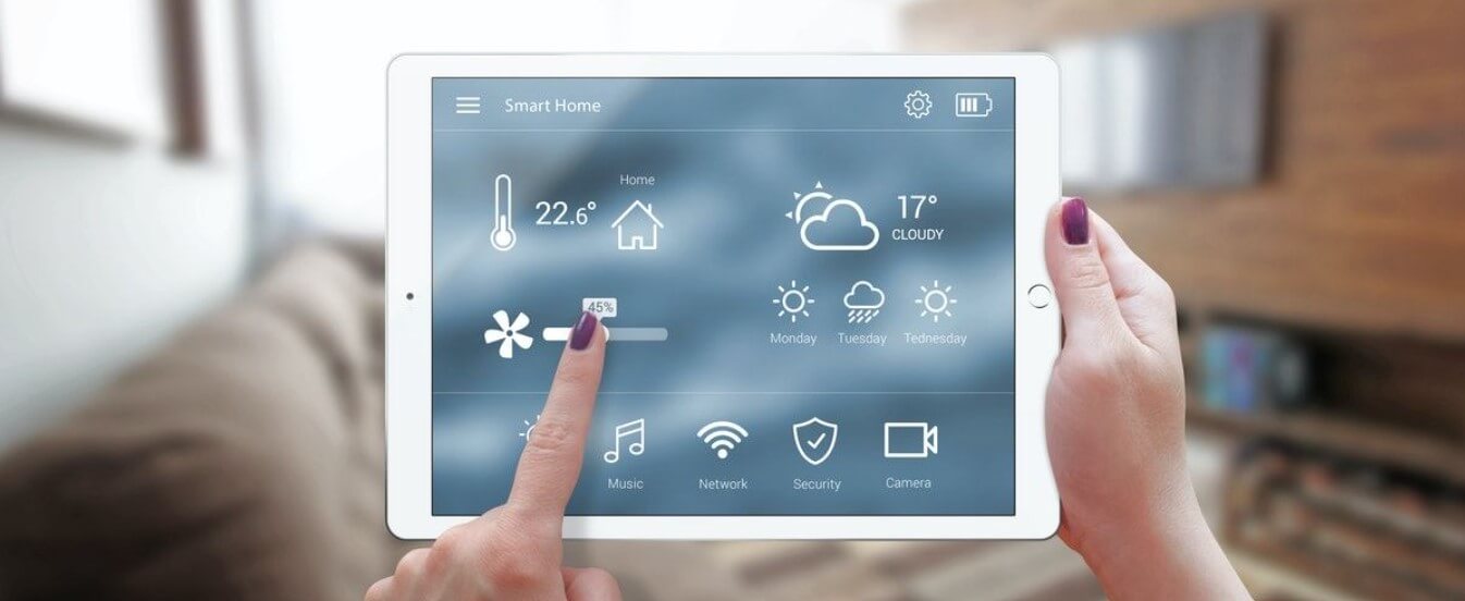 Uswitch savings banner featuring tablet displaying smart home energy monitoring