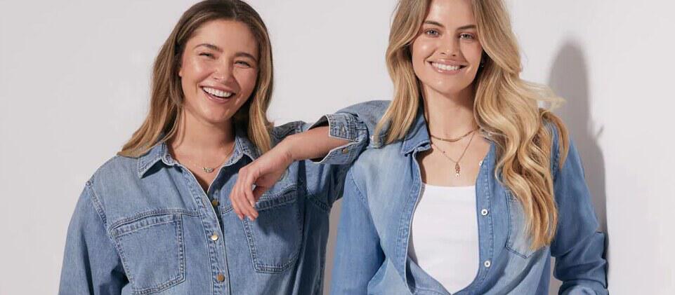 White & Co deals page banner showing two smiling women wearing denim outfits