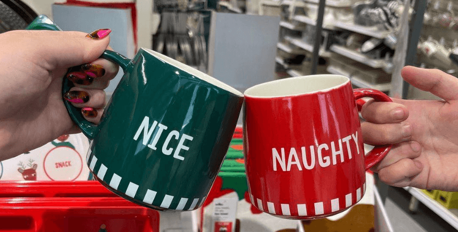 Wilko Christmas banner showing 2 mugs displaying naughty and nice messaging